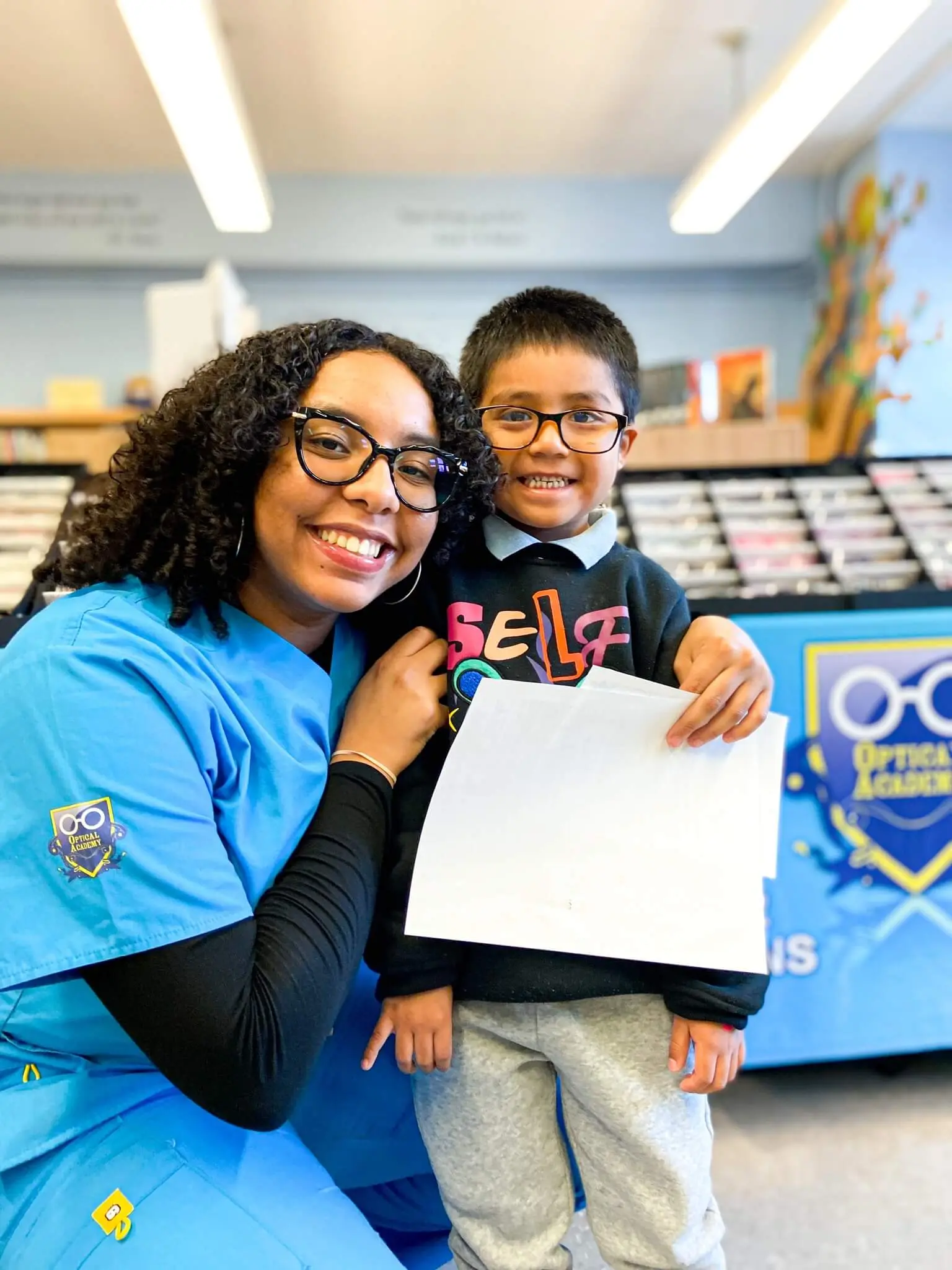 Young student smiling with new glasses