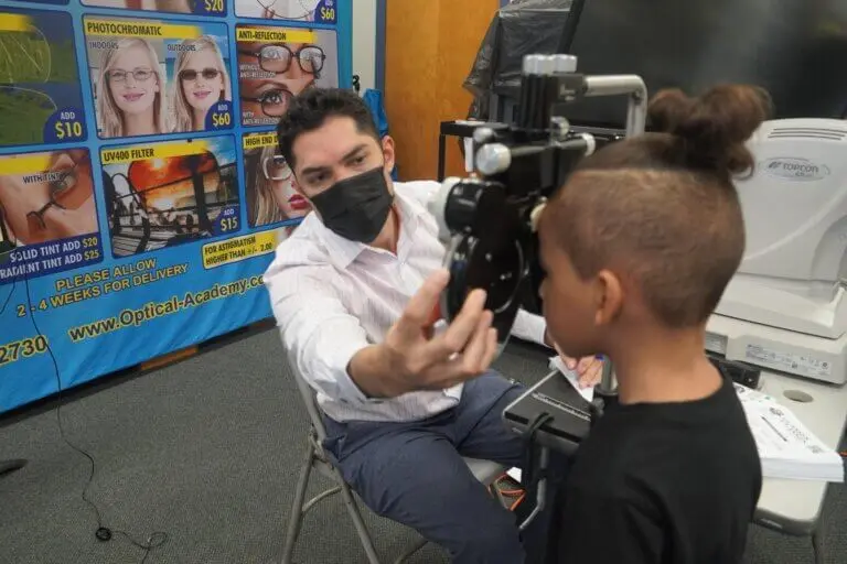 Student receiving a full eye exam onsite